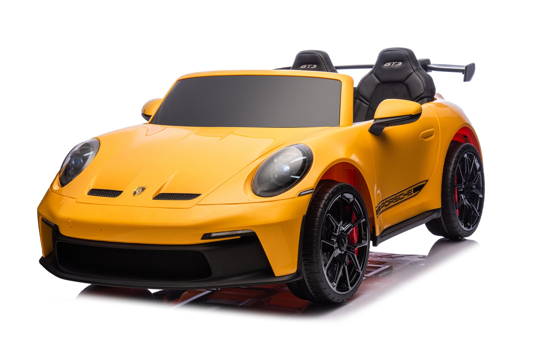 Child riding an electric ride-on car
